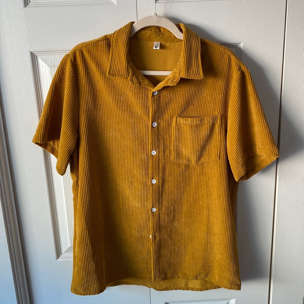 Unique golden brown corduroy shirt.
